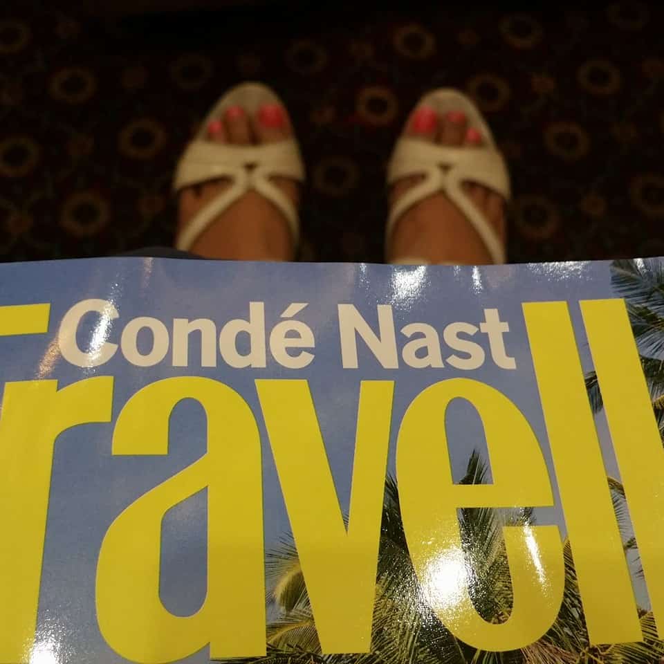 Travel magazine and heels